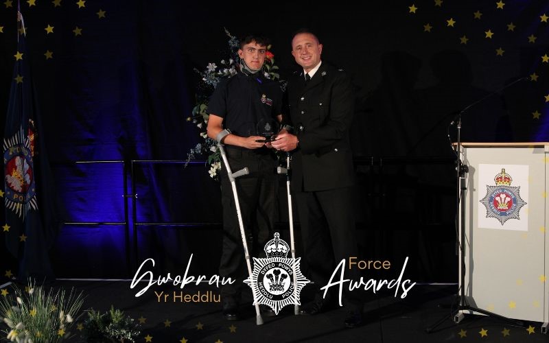 Picture of Tyler Brian receiving his award