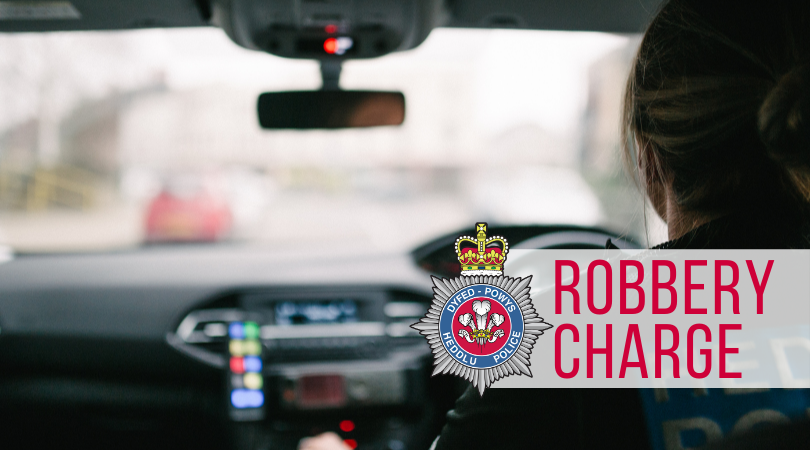 Man charged with robbery at Llanelli shop