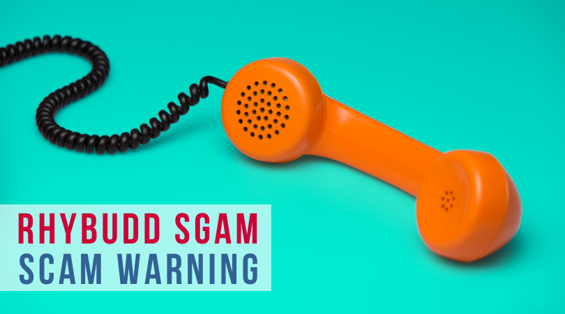 Picture of orange telephone receiver on a green background, with the words "Rhybudd Sgam, Scam Warning" to the left.
