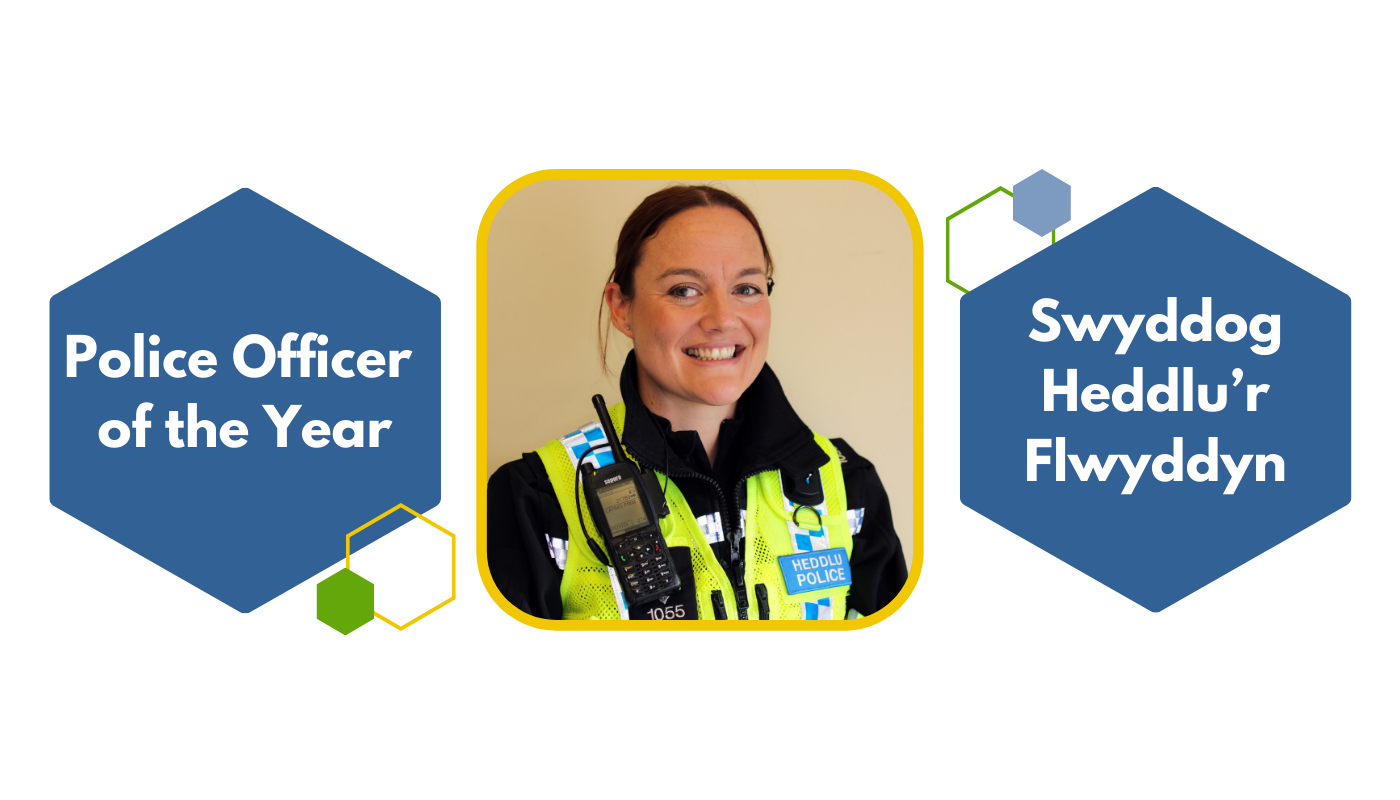 Sgt Gemma Davies in centre with the words 'Police Officer of the Year' bilingually either side