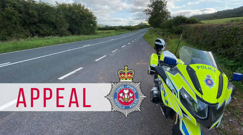 Generic image of a police bike on a road