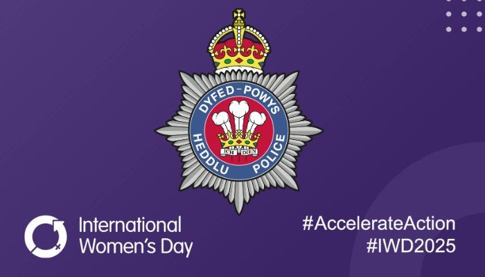 dyfed-powys police logo on a purple background